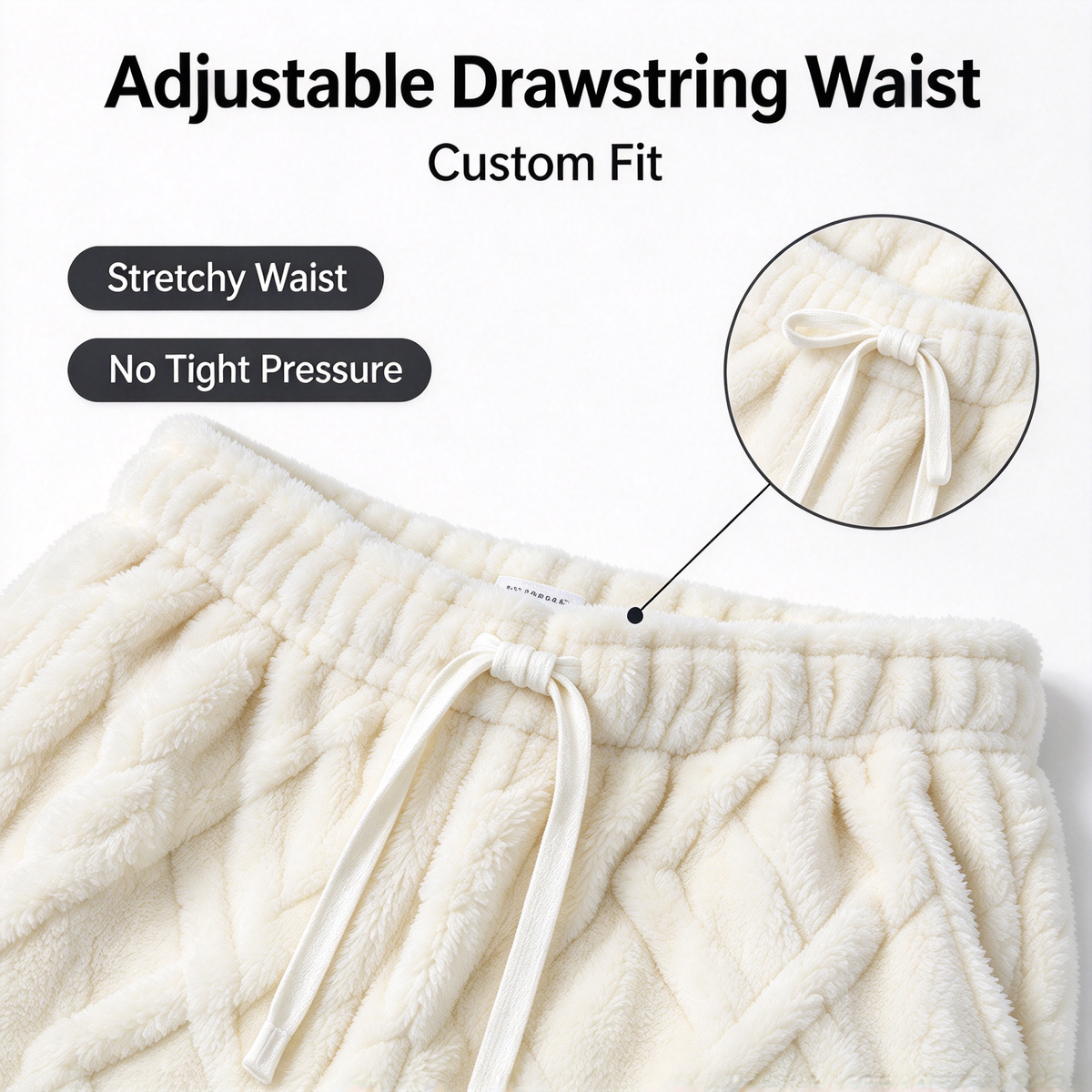 Close-up of the elastic waistband and adjustable drawstring on cream fleece pants