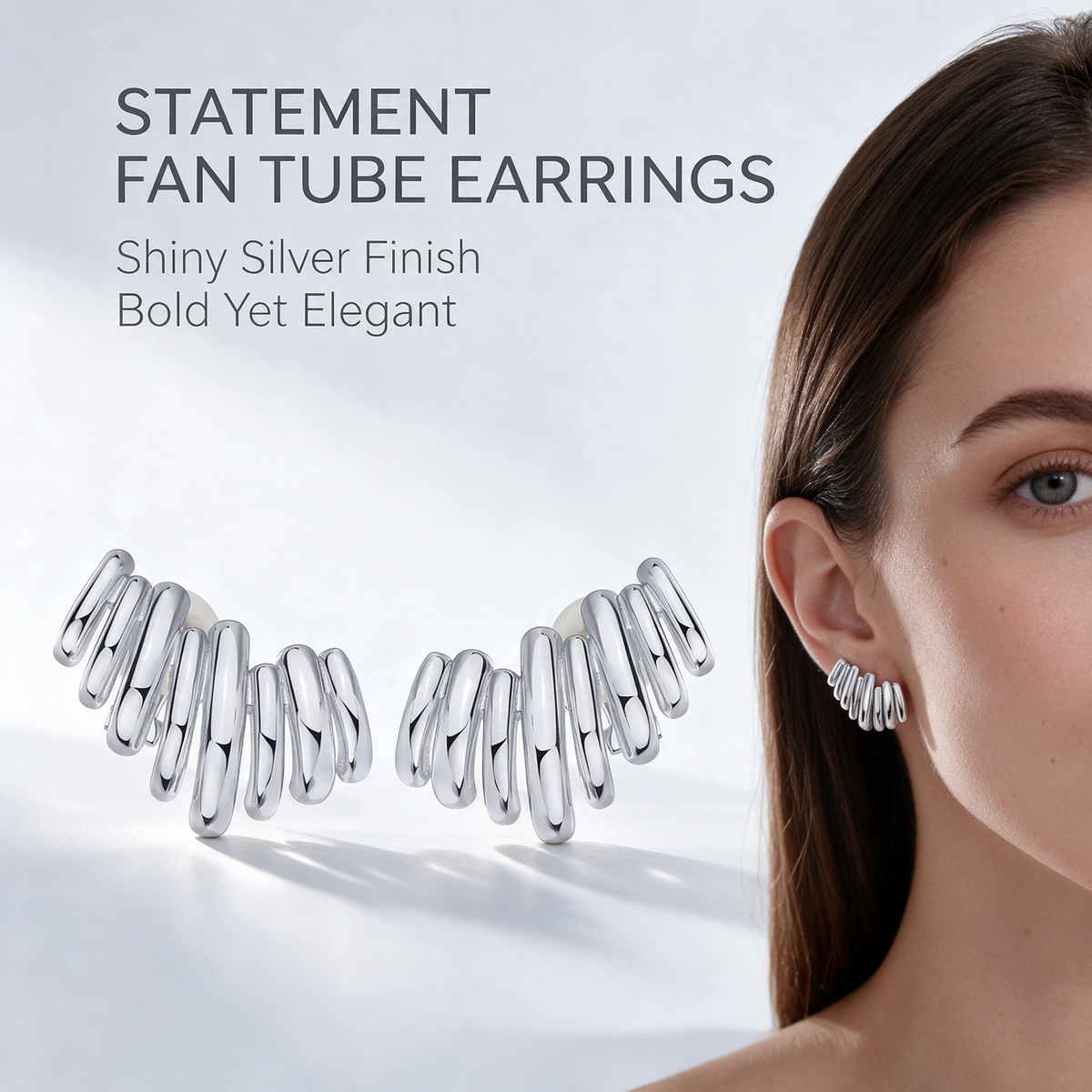 Silver fan tube climber earrings styled on the ear